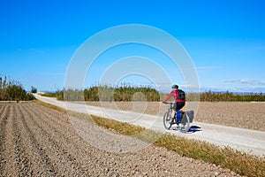 Biker MTB cycle tourism with panniers in Spain