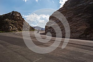 Biker passes on motorcycle on road photo