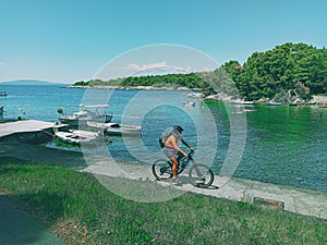 A biker in the port in Suha Punta in Rab island