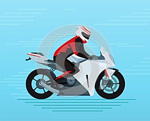 Biker In a protective suit and helmet rides a sports bike.