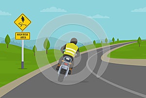 Biker riding motorcycle on the highway. Cornering or turning bike on high risk area