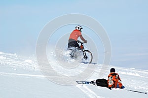 Biker and skier