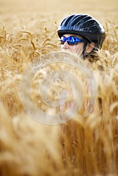 Biker in wheat field