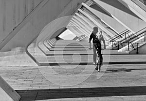 bikerider under the science museum of Valencia