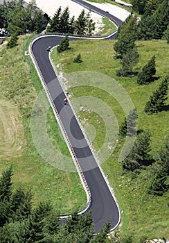 Bikers along the way with many curves in the mountains