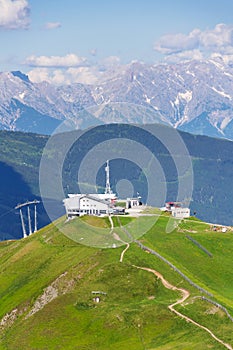 Bikers downhill X-line trail from Schattberg-Ost mountain, Saalbach-Hinterglemm