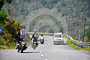 Bikers , enjoying the thrill of curvy highway