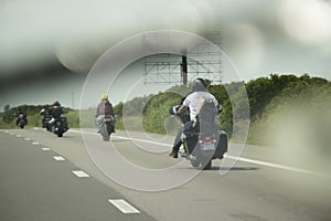 Bikers riding on the road
