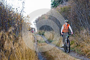 Bikers travel in difficult conditions in autumn