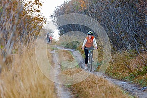 Bikers travel in difficult conditions in autumn