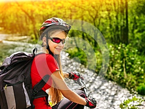 Bikes bicyclist girl rides bicycle mountains. Woman on vehicle mountaineering.