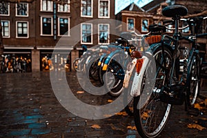 Bikes on a Bridge in Amsterdam, Netherlands Wet Overcast Weather Vacation Destination Transportation