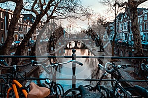 Bikes on a Bridge in Amsterdam, Netherlands Wet Overcast Weather Vacation Destination Transportation