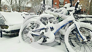 Bikes covered by snow