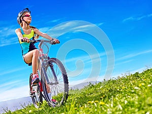 Bikes cycling girl wearing helmet rides bicycle.