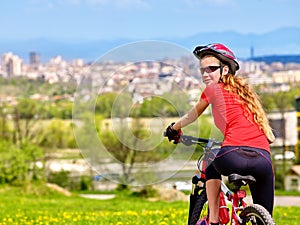 Bikes cycling girl wearing helmet.