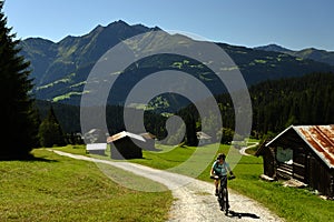 Biking in Alp Nagens, Flims, Graubunden, Switzerland photo