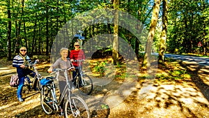 Biking through the heather fields and forests in the Hoge Veluwe nature reserve