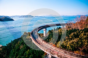 Biking on Kurushima Kaikyo Bridge - Ehime - Japan photo