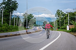 Biking travel tour on rural road