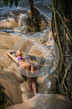 Bikini Girl enjoys refreshing water of sticky waterfall Bua Tong Waterfalls Chiang Mai