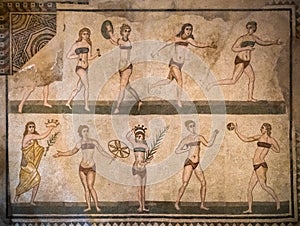 Bikini girls mosaics in Villa Romana del Casale, Piazza Armerina, Sicilia, Italy photo