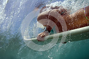 Bikini Teen Surfer Duckdiving