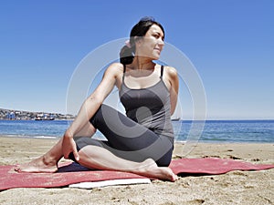 Bikram yoga arda matsyendrasana pose photo