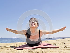 Bikram yoga paorna salabhasana pose frontal view photo