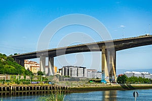 06 10 2022 - Bilbao, Spain: Rontegi bridge across the Nervion river. Arrontegi zubia, Baracaldo photo