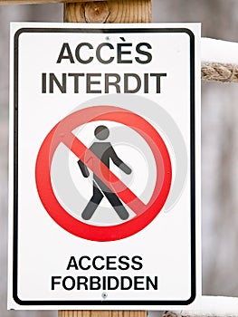 Bilingual access forbiden sign photo