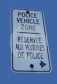 Bilingual police vehicle zone