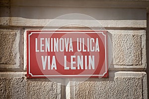 Bilingual street sign indicating Leninova Ulica in Slovenian and Via Lenin in Italian, meaning Lenin street photo