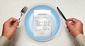 Bill on empty plate for visitor