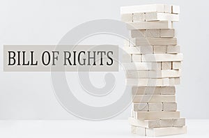 BILL OF RIGHTS text with wooden block stack on white background , business concept