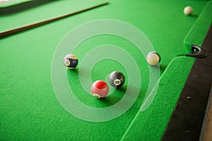 Billard balls on green billard table