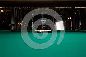 Billards pool game. Green cloth table with white balls