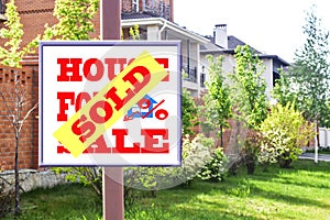 A Billboard advertising the sale of real estate .