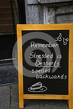 Billboard with inscription Stressed is Desserts spelled backwards photo