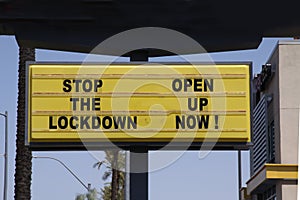 Billboard saying Stop the Lockdown - Open Up Now! Anti-lockdown protests photo