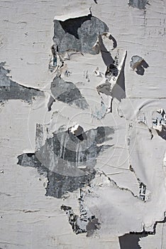 the Billboard with torned posters. Vintage background and texture