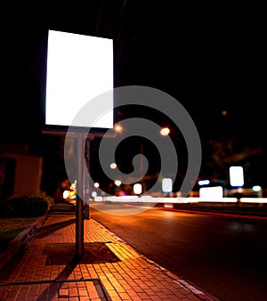 Billboards at bus stop in night