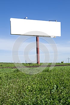 Billboards on green field