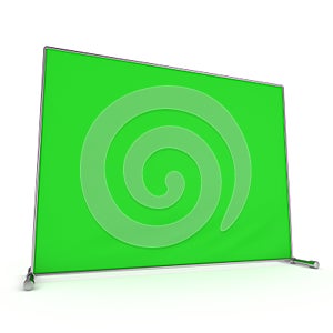 Billet press wall with green screen banner.