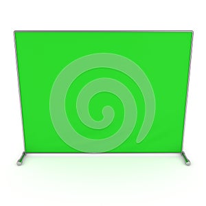 Billet press wall with green screen banner.