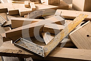 Billets of wood for furniture lie on a workbench photo
