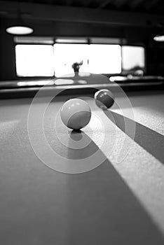 a billiard ball lies on a billiard table