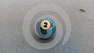 The billiard ball showing the number 2