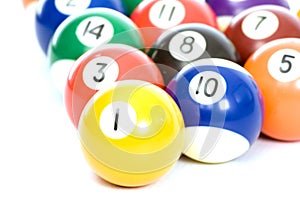 Billiard balls arranged on a white background