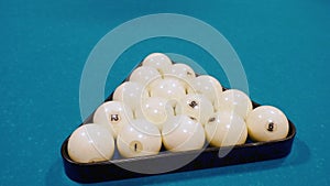 Billiard balls on a billiard table background pyramid. Russian biiliard game